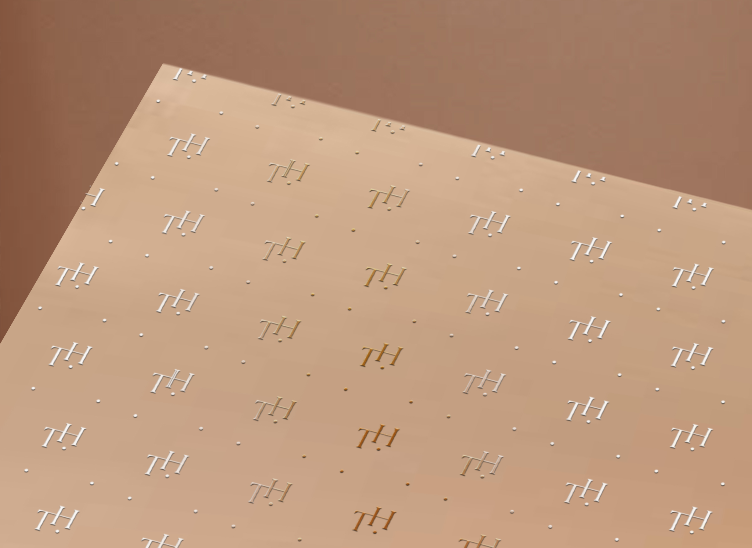 Weißes Blatt mit rotem „TH“ in regelmäßigen Abständen